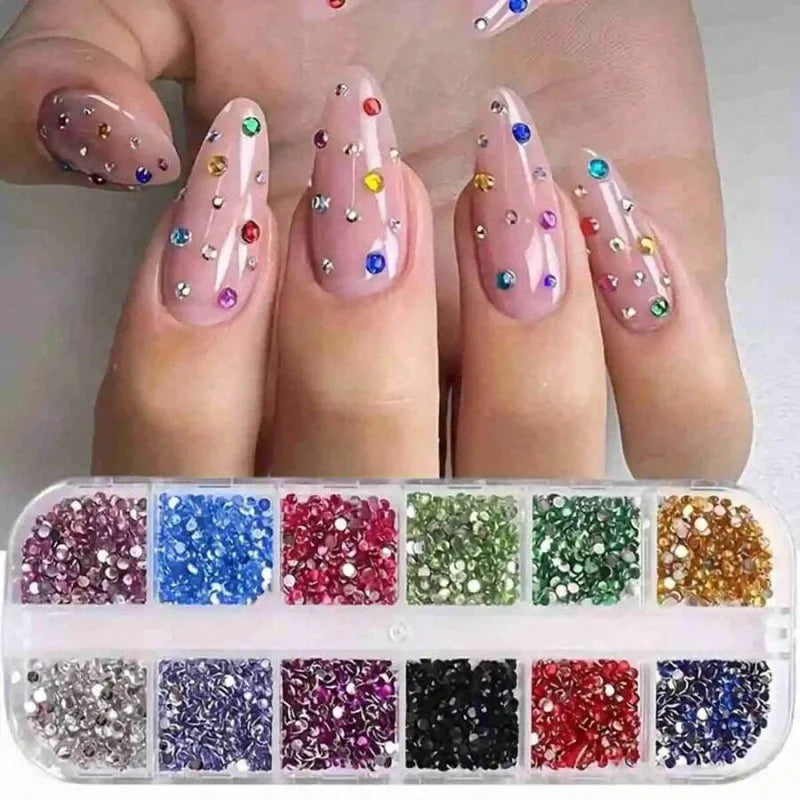 12-pack box of nail accessories: flat-bottom rhinestones, decorative nail embellishments, assorted small components, colorful nail stickers with rhinestones. - Curl and Collar