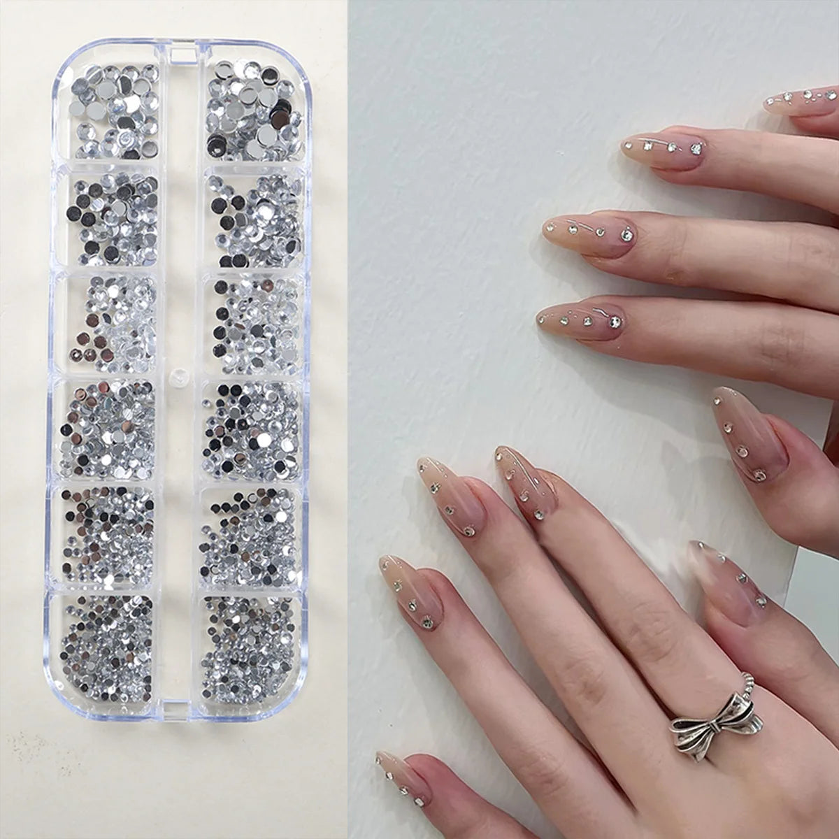 12-pack box of nail accessories: flat-bottom rhinestones, decorative nail embellishments, assorted small components, colorful nail stickers with rhinestones. - Curl and Collar